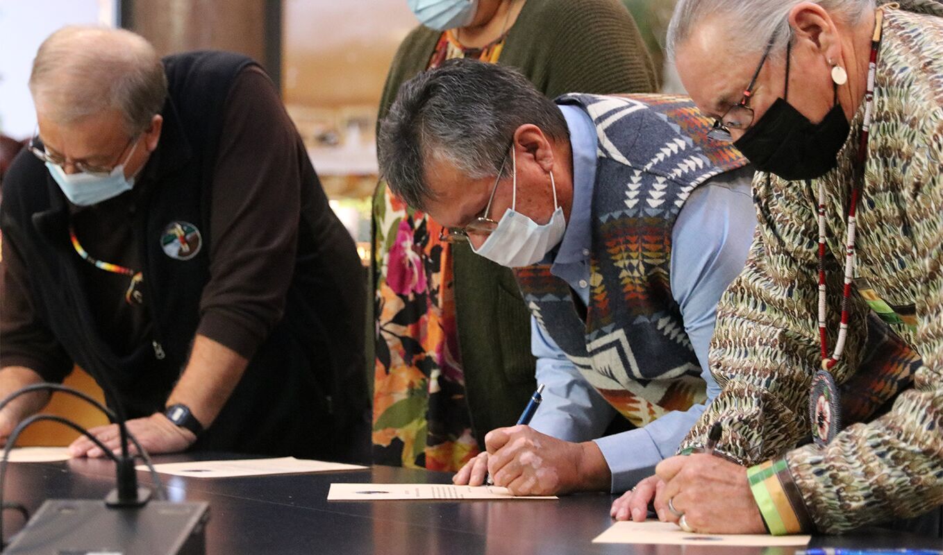 Signing the Oath of Office